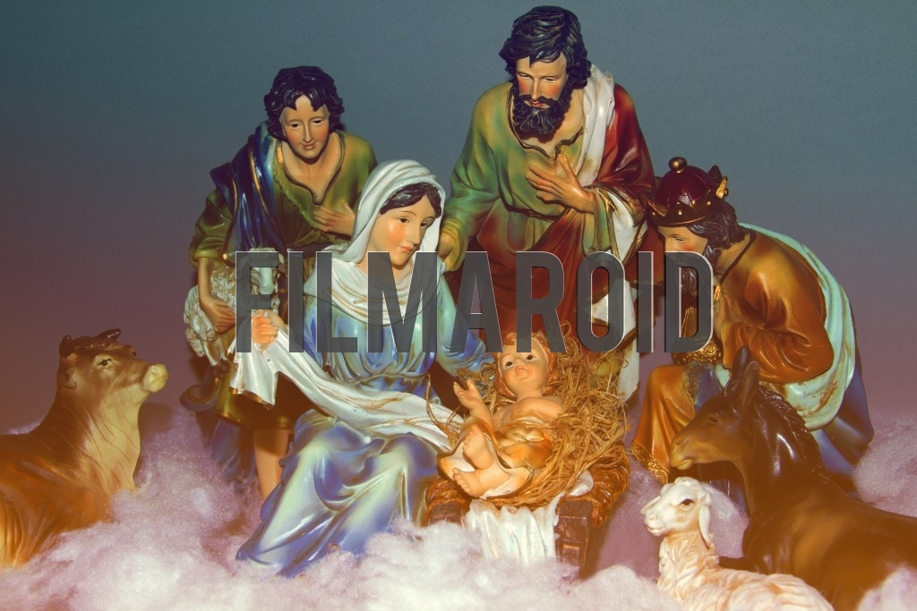 The Nativity Scene with resin figures The Nativity Scene with resin figures - Beautiful Nativity of Jesus represented with resin figures of the holy family, shepherd, king and animals, against a neutral gray background