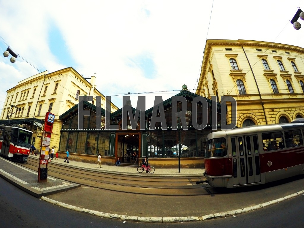 Exterior of European Train Station Masarykovo Nadrazi Prague Exterior of European Train Station Masarykovo Nadrazi Prague - Front view of a European Train Station Masarykovo Nadrazi in Prague with trams passing by