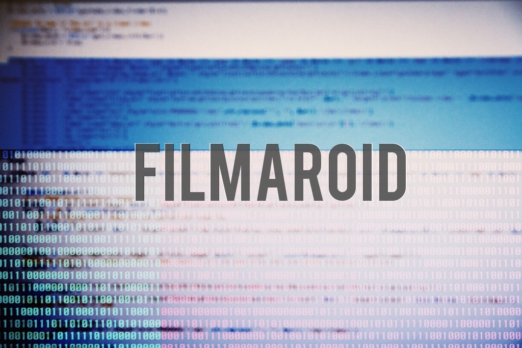 Computer or tablet screenshot of software with several lines of code and colorful sequence of bits
