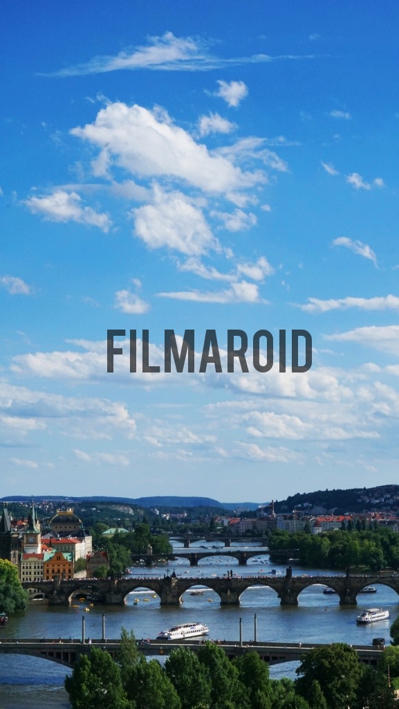 Summer afternoon with cloudy blue sky over the Vltava river in Prague