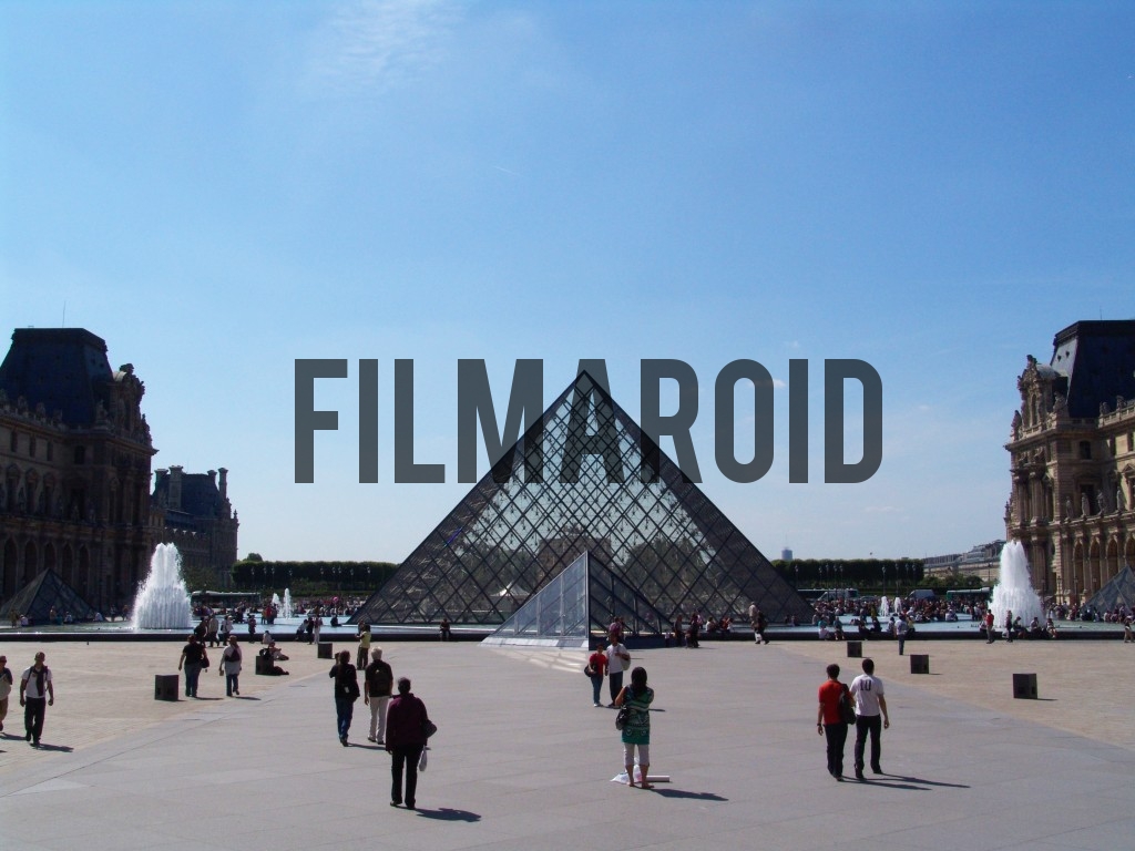 Louvre Museum frontal view pyramid Louvre Museum frontal view pyramid - View of the Louvre Museum and its surroundings