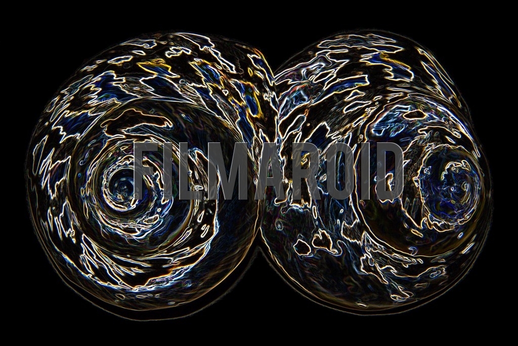 Large set of seashells portraying beautiful patterns and texture with a glowing effect and against a pitch black background
