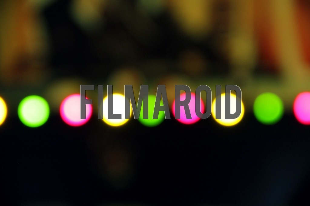 Background of multicolor LED lights blinking and captured out of focus