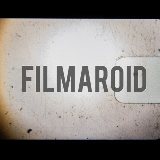 Vintage 8mm film clear frame with dust and specs - A collection of stock photos of Film Grain Scans