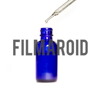 Backgrounds - Blue glass bottle no lid with dropper above isolated against white background Blue glass bottle no lid with dropper above isolated against white background - A collection of stock photos with diverse backgrounds