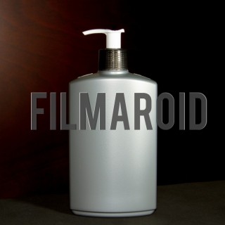 Backgrounds - Isolated hands lotion bottle against a wooden background Isolated hands lotion bottle against a wooden background - A collection of stock photos with diverse backgrounds