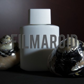 White lotion bottle with seashells wooden background - A collection of stock photos with diverse backgrounds