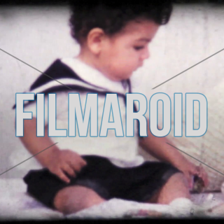 Kodachrome archival footage of baby celebrating bday - Kodachrome archival footage of the celebration of a baby boy's bday during the 1960s with cake and gifts