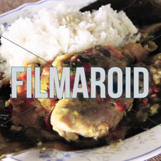 Colombian tamal served with white rice - A Colombian tamal being served with traditional white rice