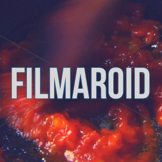 Cooking and mixing tomato sauce with kitchen wooden stirring spoon - Cooking and mixing a bright red tomato sauce using a big kitchen wooden stirring spoon