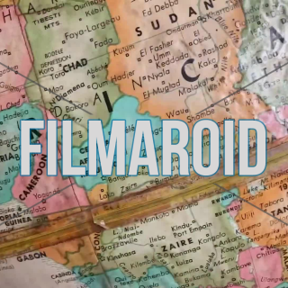 4k footage of vintage world globe spinning and stopping on the central african region - 4k Antique earth globe spinning vintage cold war times world map stopping on the Central African region