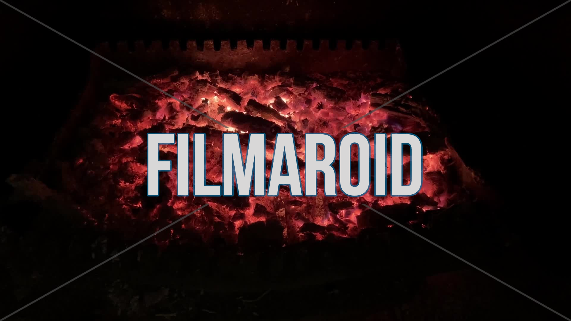 4k slowly moving forward footage of burning red chunks of wood inside a chimney with flying sparks and small flames, after hours of active fire