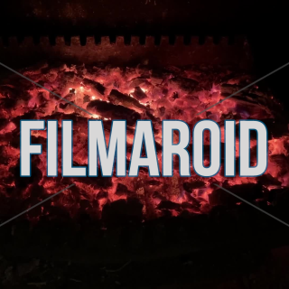 4k footage of burning redhot wood chunks on fireplace with active sparks and flames - 4k slowly moving forward footage of burning red chunks of wood inside a chimney with flying sparks and small flames, after hours of active fire